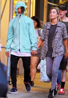 Smith holding hands with his then girlfriend Stella Hudgens.